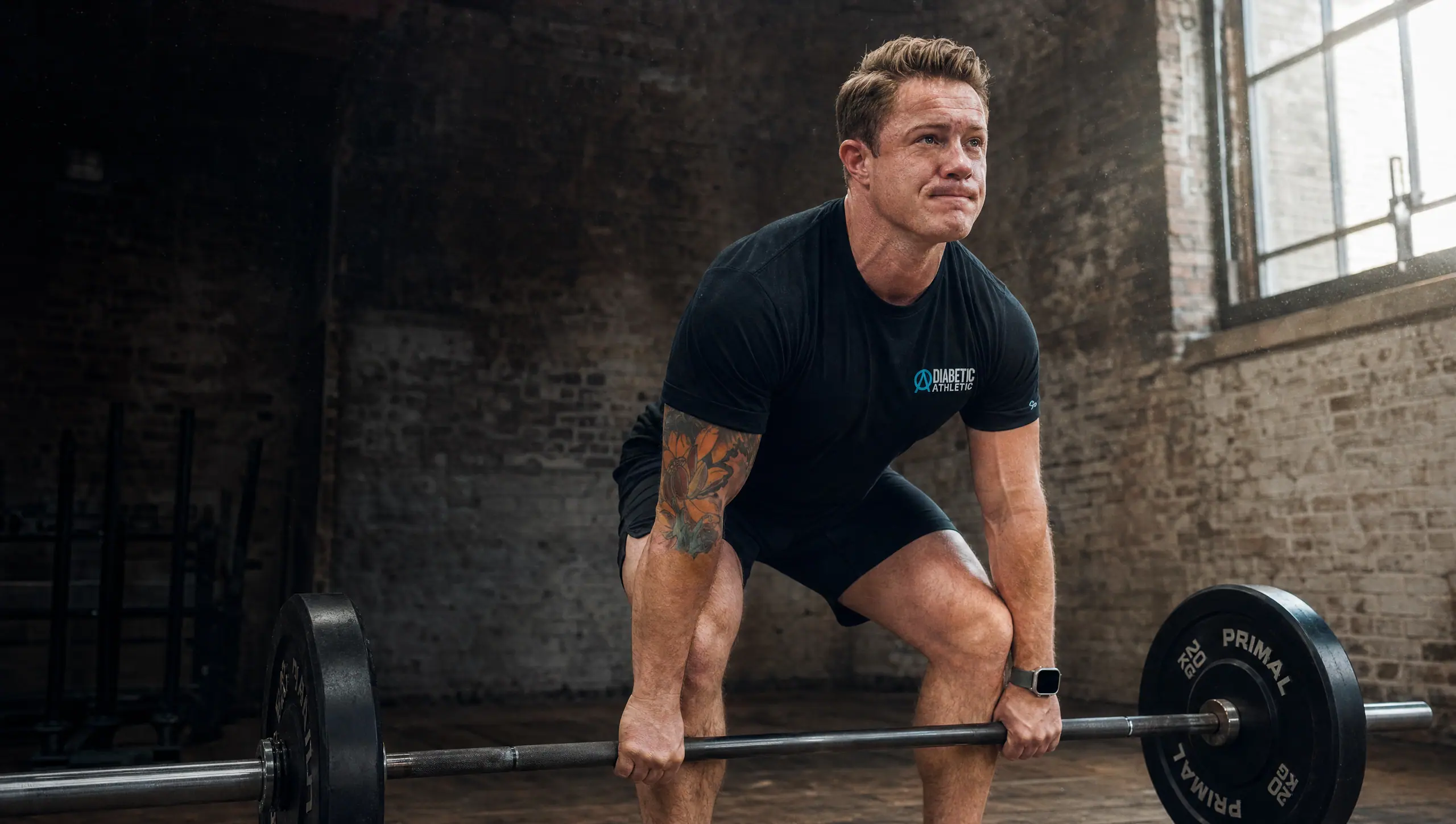 Nicholas, Diabetic Athletic Club coach, in an industrial gym